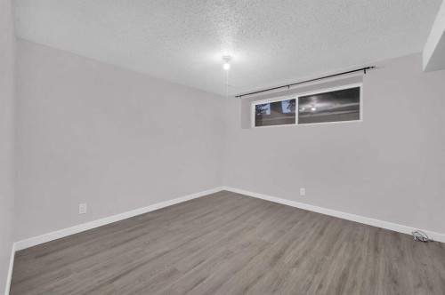 5868 Dalcastle Drive Nw, Calgary, AB - Indoor Photo Showing Other Room