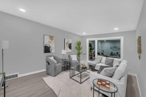 5868 Dalcastle Drive Nw, Calgary, AB - Indoor Photo Showing Living Room