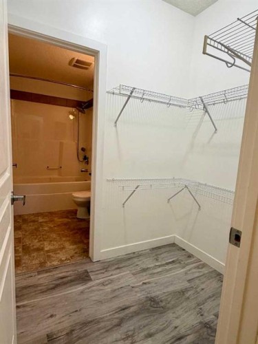 112-48 Panatella Road Nw, Calgary, AB - Indoor With Storage
