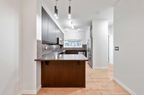 708 Evansridge Common Nw, Calgary, AB - Indoor Photo Showing Kitchen
