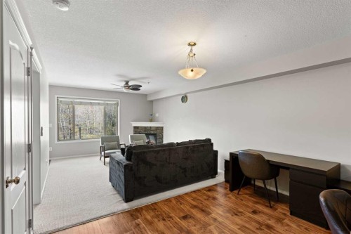315-300 Palliser Lane, Canmore, AB - Indoor With Fireplace