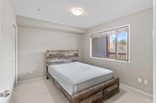 315-300 Palliser Lane, Canmore, AB - Indoor Photo Showing Bedroom