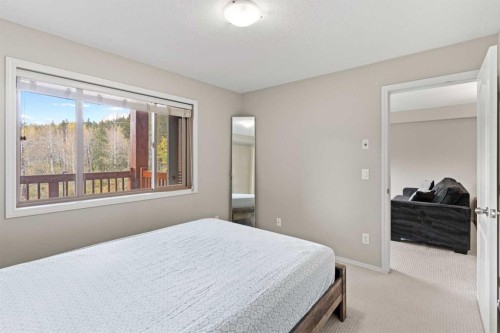 315-300 Palliser Lane, Canmore, AB - Indoor Photo Showing Bedroom