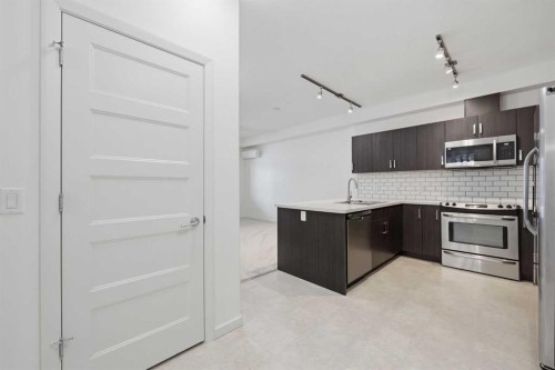 3406-450 Kincora Glen Road Nw, Calgary, AB - Indoor Photo Showing Kitchen