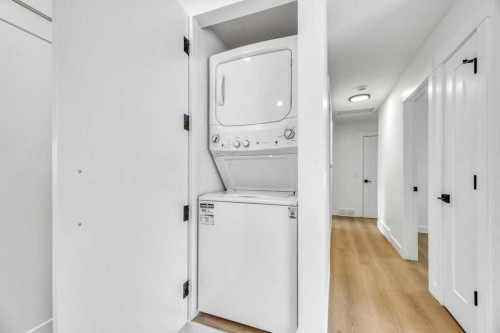 32 Allandale Close Se, Calgary, AB - Indoor Photo Showing Laundry Room