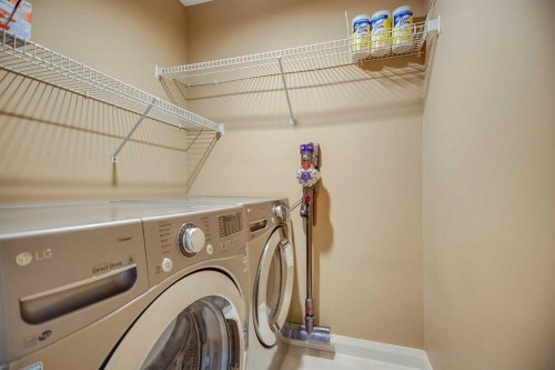 113 Somerside Green Sw, Calgary, AB - Indoor Photo Showing Laundry Room