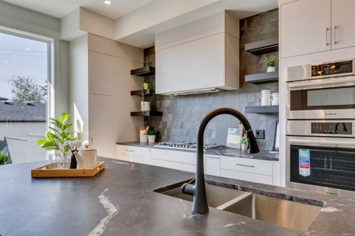 2013 23 Avenue Nw, Calgary, AB - Indoor Photo Showing Kitchen With Double Sink With Upgraded Kitchen