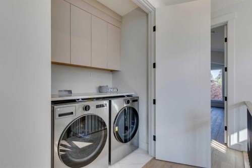 2013 23 Avenue Nw, Calgary, AB - Indoor Photo Showing Laundry Room