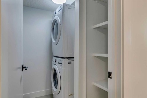 2013 23 Avenue Nw, Calgary, AB - Indoor Photo Showing Laundry Room