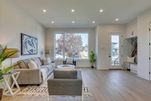 2013 23 Avenue Nw, Calgary, AB - Indoor Photo Showing Living Room