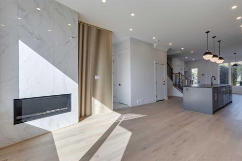 2015 23 Avenue Nw, Calgary, AB - Indoor With Fireplace