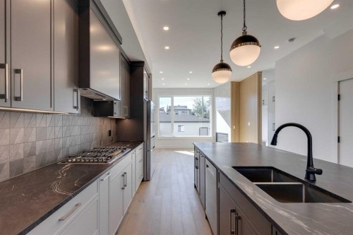 2015 23 Avenue Nw, Calgary, AB - Indoor Photo Showing Kitchen With Double Sink With Upgraded Kitchen