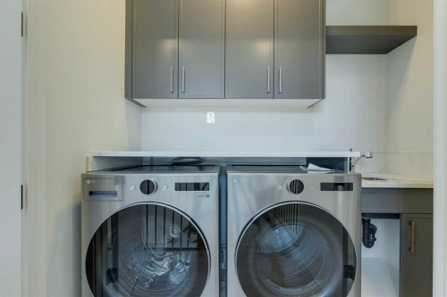 2015 23 Avenue Nw, Calgary, AB - Indoor Photo Showing Laundry Room