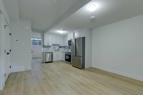 2015 23 Avenue Nw, Calgary, AB - Indoor Photo Showing Kitchen
