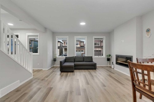 124 Cityside Crescent Ne, Calgary, AB - Indoor Photo Showing Living Room With Fireplace