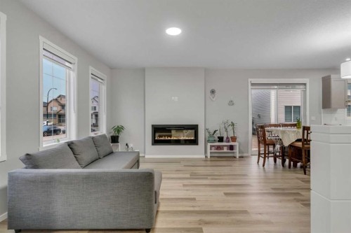 124 Cityside Crescent Ne, Calgary, AB - Indoor Photo Showing Living Room With Fireplace
