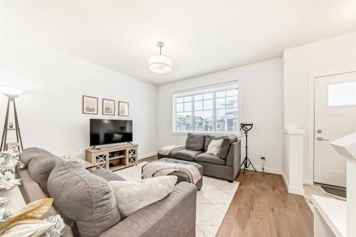106 Dawson Harbour Grove, Chestermere, AB - Indoor Photo Showing Living Room