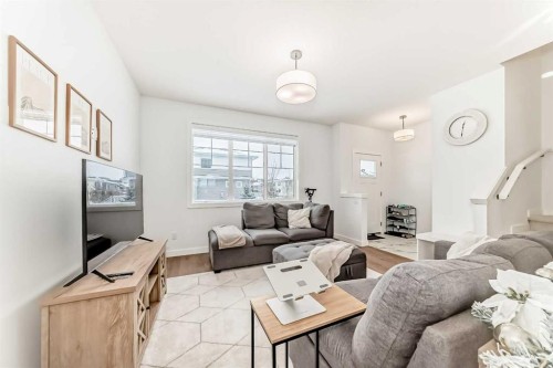 106 Dawson Harbour Grove, Chestermere, AB - Indoor Photo Showing Living Room