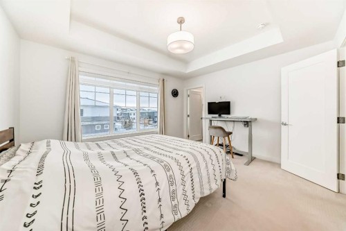 106 Dawson Harbour Grove, Chestermere, AB - Indoor Photo Showing Bedroom