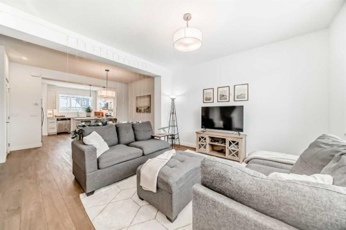 106 Dawson Harbour Grove, Chestermere, AB - Indoor Photo Showing Living Room