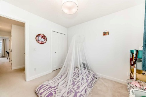 106 Dawson Harbour Grove, Chestermere, AB - Indoor Photo Showing Bedroom