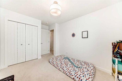 106 Dawson Harbour Grove, Chestermere, AB - Indoor Photo Showing Bedroom