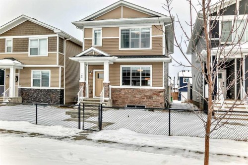 106 Dawson Harbour Grove, Chestermere, AB - Outdoor With Facade