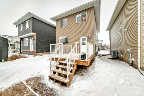 106 Dawson Harbour Grove, Chestermere, AB - Outdoor With Exterior