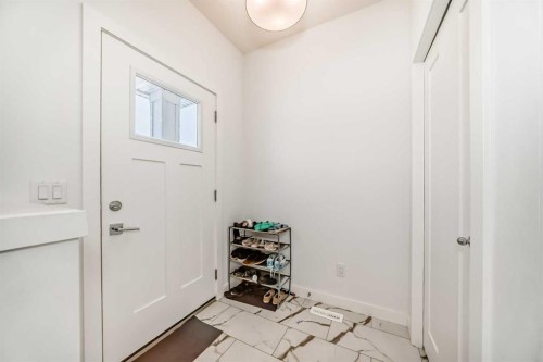 106 Dawson Harbour Grove, Chestermere, AB - Indoor Photo Showing Other Room