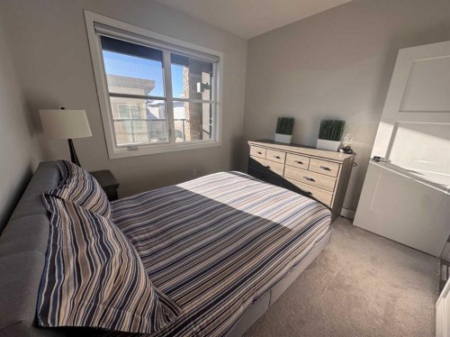 110-8355 19 Avenue Sw, Calgary, AB - Indoor Photo Showing Bedroom