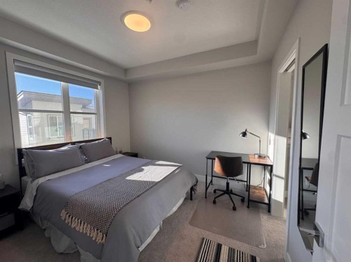 110-8355 19 Avenue Sw, Calgary, AB - Indoor Photo Showing Bedroom