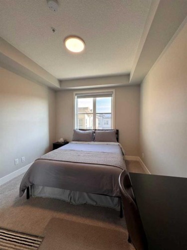 110-8355 19 Avenue Sw, Calgary, AB - Indoor Photo Showing Bedroom
