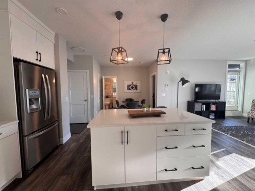 110-8355 19 Avenue Sw, Calgary, AB - Indoor Photo Showing Kitchen With Upgraded Kitchen