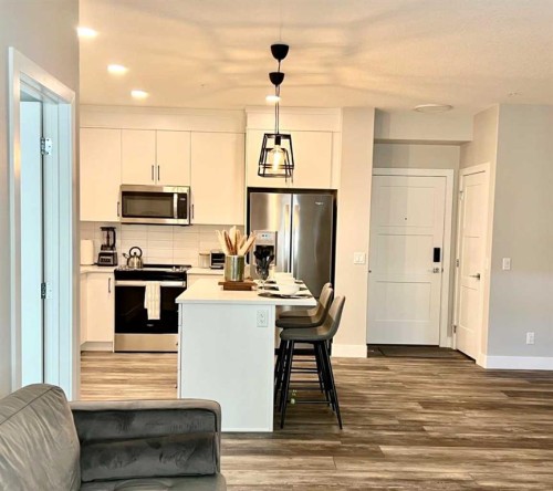 110-8355 19 Avenue Sw, Calgary, AB - Indoor Photo Showing Kitchen With Upgraded Kitchen