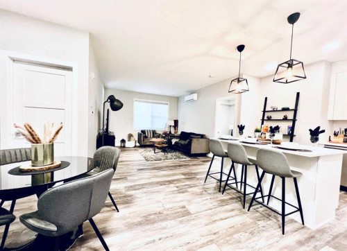 110-8355 19 Avenue Sw, Calgary, AB - Indoor Photo Showing Dining Room