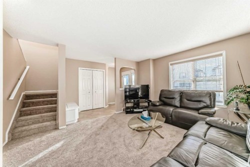 79 Saddlebrook Common Ne, Calgary, AB - Indoor Photo Showing Living Room