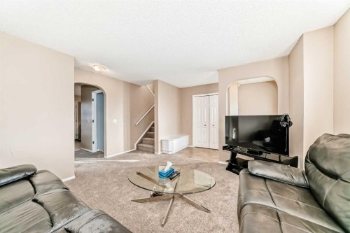 79 Saddlebrook Common Ne, Calgary, AB - Indoor Photo Showing Living Room