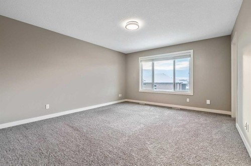 90 Mount Rae Heights, Okotoks, AB - Indoor Photo Showing Other Room