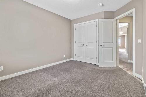 90 Mount Rae Heights, Okotoks, AB - Indoor Photo Showing Other Room