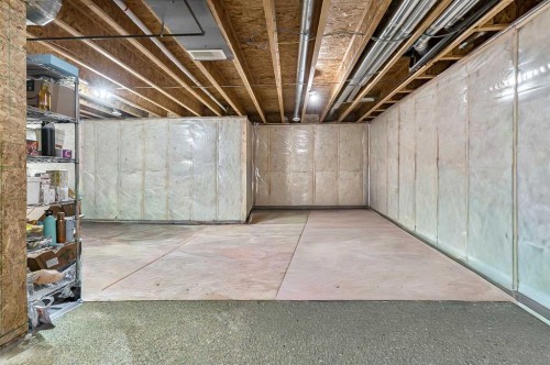 90 Mount Rae Heights, Okotoks, AB - Indoor Photo Showing Basement