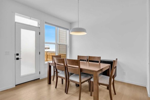 16 Magnolia Bay Se, Calgary, AB - Indoor Photo Showing Dining Room