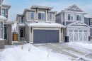 16 Magnolia Bay Se, Calgary, AB  - Outdoor With Facade 