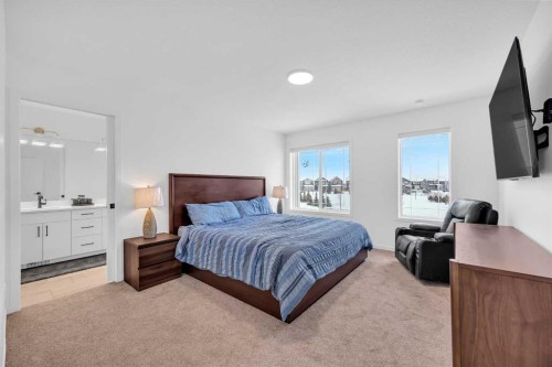 16 Magnolia Bay Se, Calgary, AB - Indoor Photo Showing Bedroom