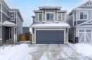 16 Magnolia Bay Se, Calgary, AB  - Outdoor With Facade 