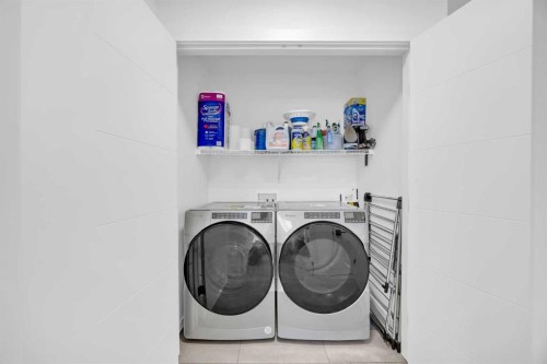 16 Magnolia Bay Se, Calgary, AB - Indoor Photo Showing Laundry Room
