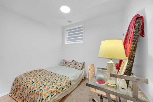 16 Magnolia Bay Se, Calgary, AB - Indoor Photo Showing Bedroom