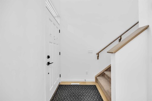 16 Magnolia Bay Se, Calgary, AB - Indoor Photo Showing Other Room
