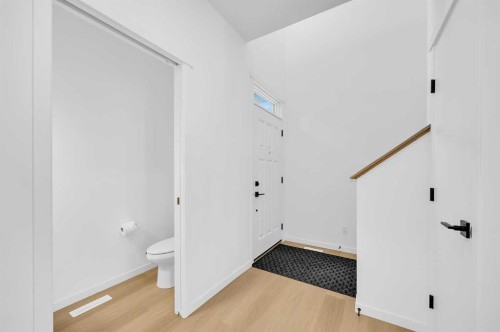 16 Magnolia Bay Se, Calgary, AB - Indoor Photo Showing Other Room