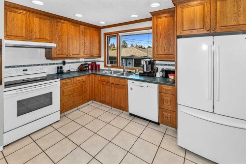46 Marbrooke Circle Ne, Calgary, AB - Indoor Photo Showing Kitchen With Double Sink