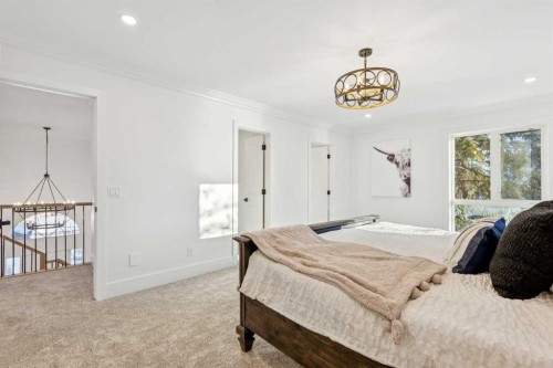 5 Mckenzie Lake Point Se, Calgary, AB - Indoor Photo Showing Bedroom